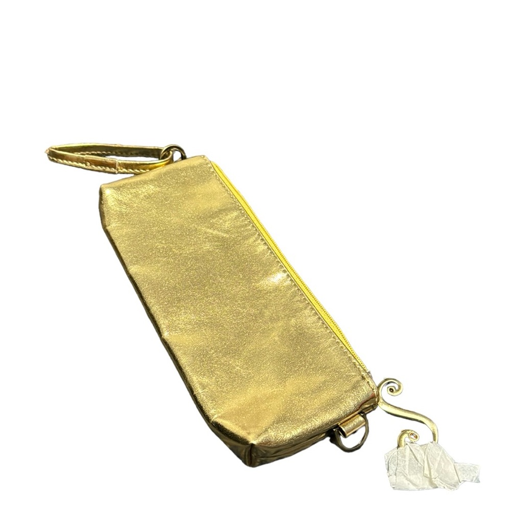 Small gold cosmetic bag w/decorative zipper pull. NWT